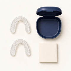 Everything in the box: two Heration night guards, the navy travel case and the moulding guide