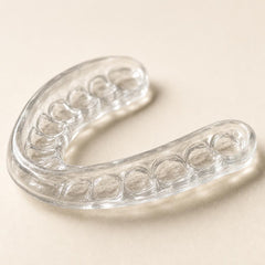 Close-up of the tooth impressions moulded into a Heration night guard